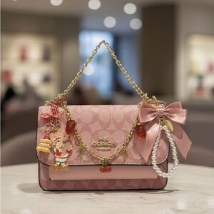 Coach Pink Shoulder Bag with Gold Accents